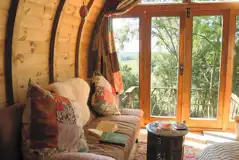 Glamping pod interior with glass front Glamping pod interior with glass front