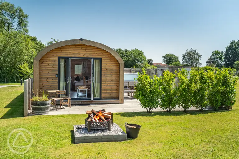 Ensuite glamping pod exterior with fire pits (four persons)