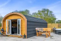 Glamping pod with hot tub