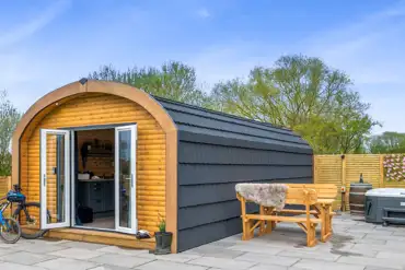 Glamping pod with an electric hot tub at Dwell On The Moor