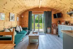 Ensuite glamping pod living area with TV Ensuite glamping pod living area with TV