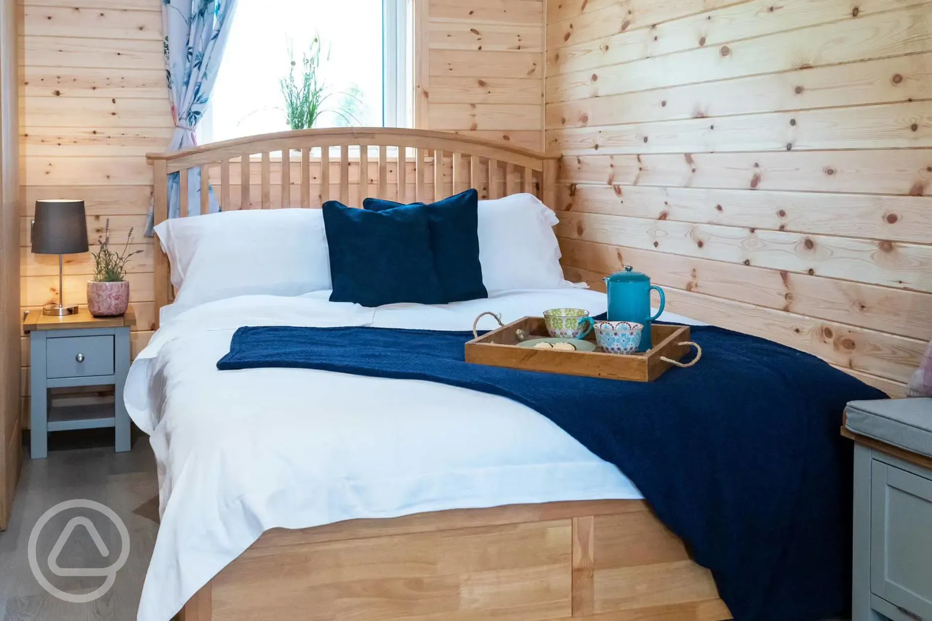 Glamping pod with hot tub double bed