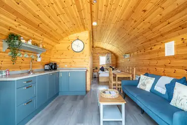 Ensuite glamping pod fully equipped kitchen and living area 