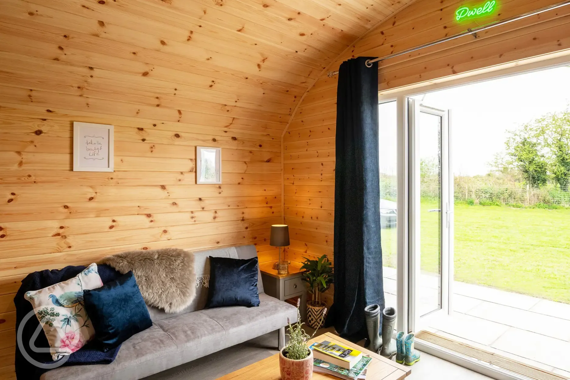 Glamping pod with hot tub living area