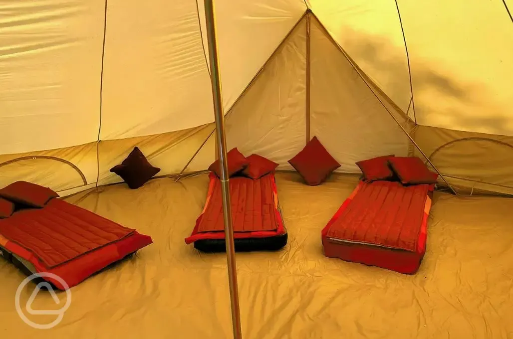 Single air mattresses in bell tent