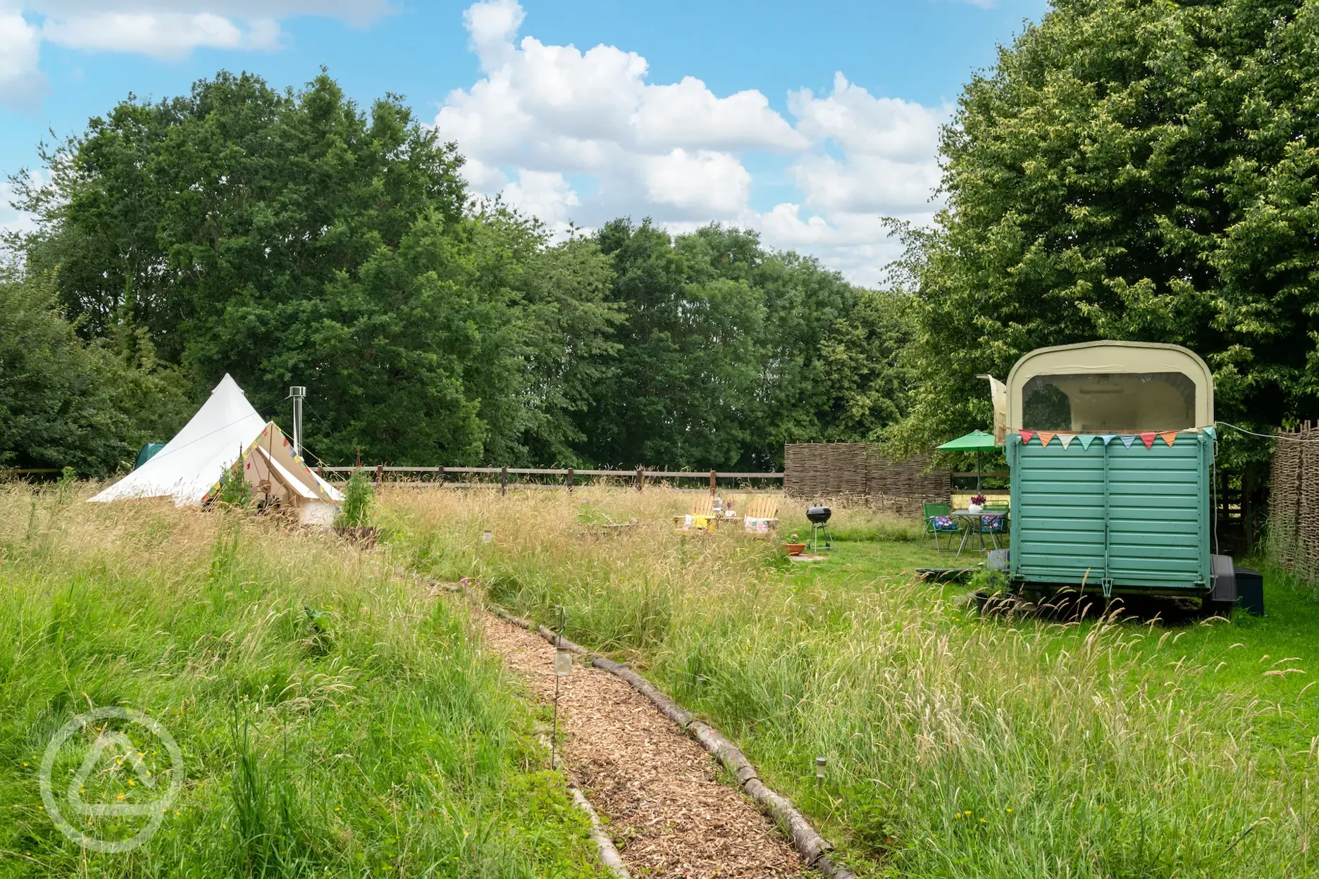 Furnished bell tent and kitchen area