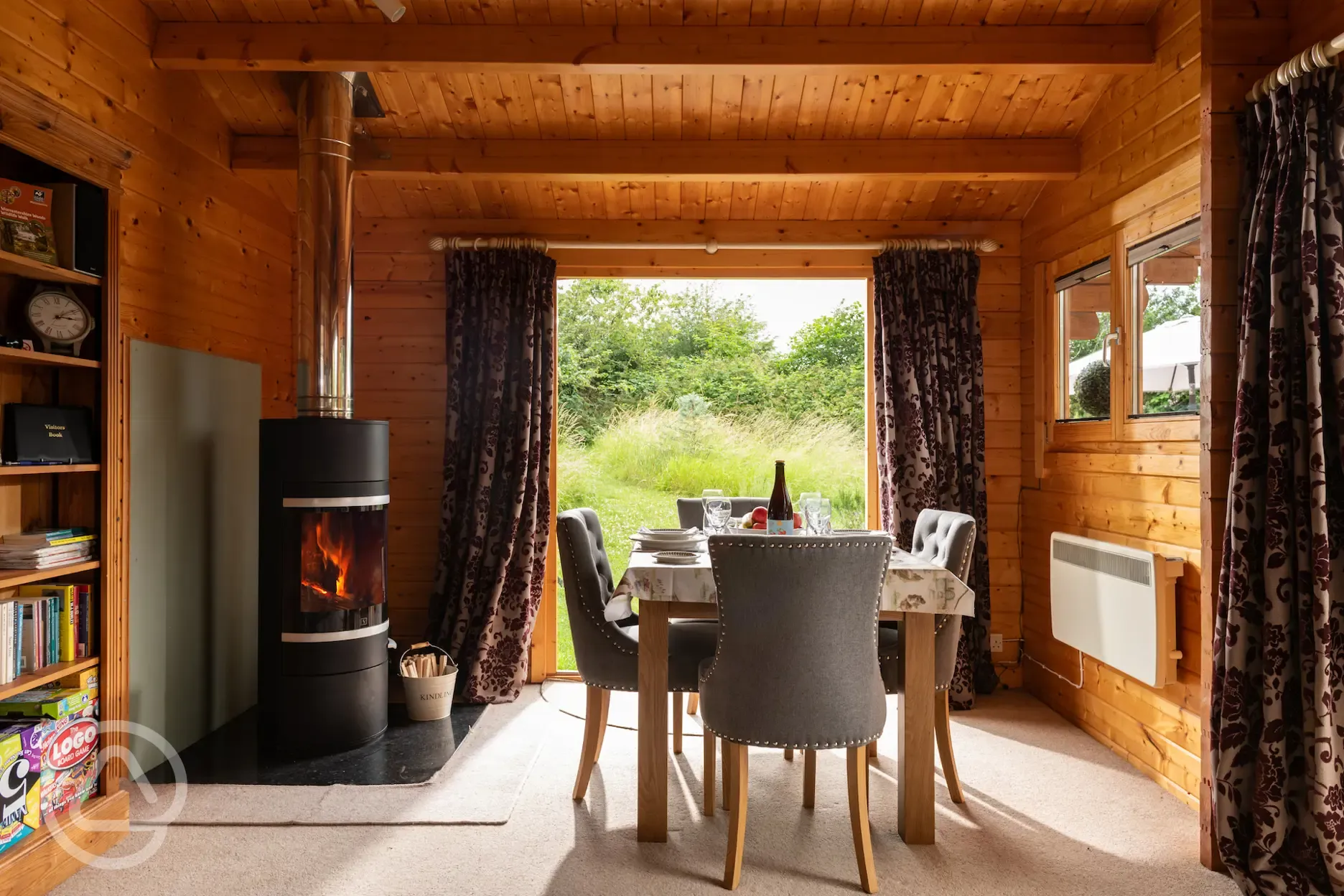 Open plan living with log burner and extendable table