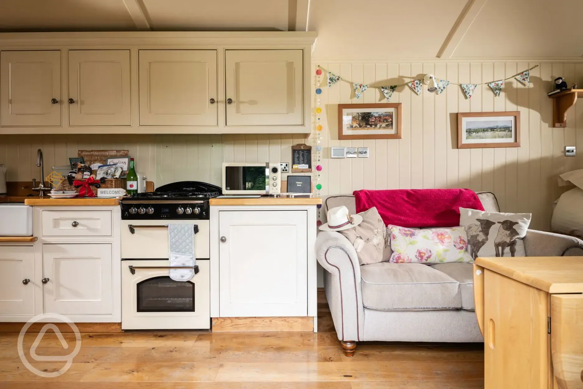 The Hideaway shepherd's hut - kitchen and living area