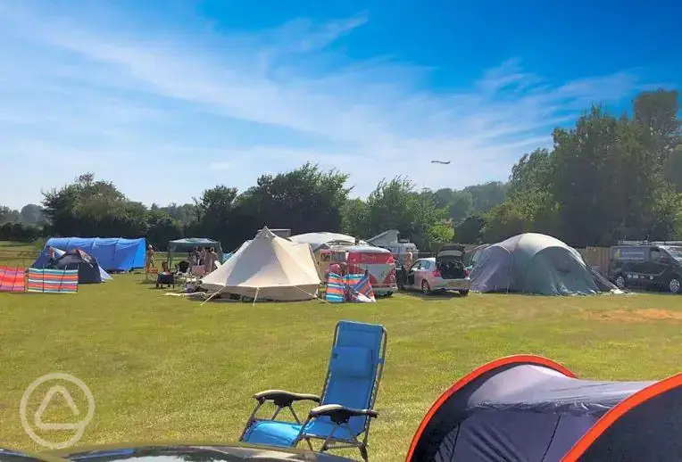 Non electric grass tent pitches