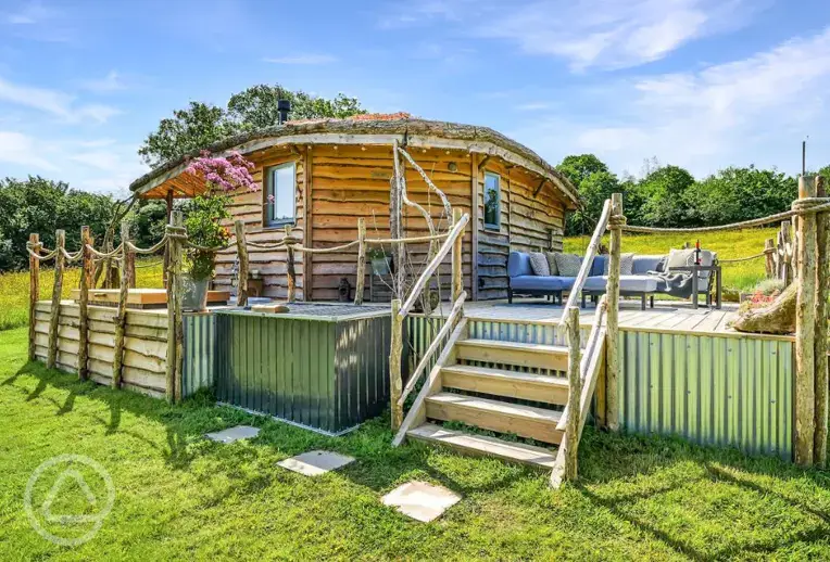 Glamping cabin exterior with steps 