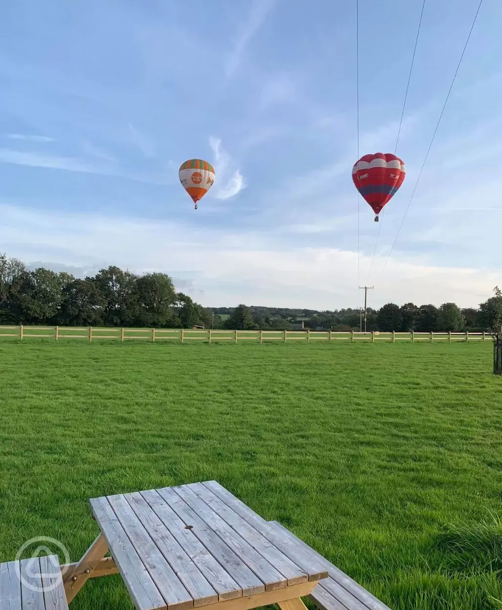 Hot air balloons over site