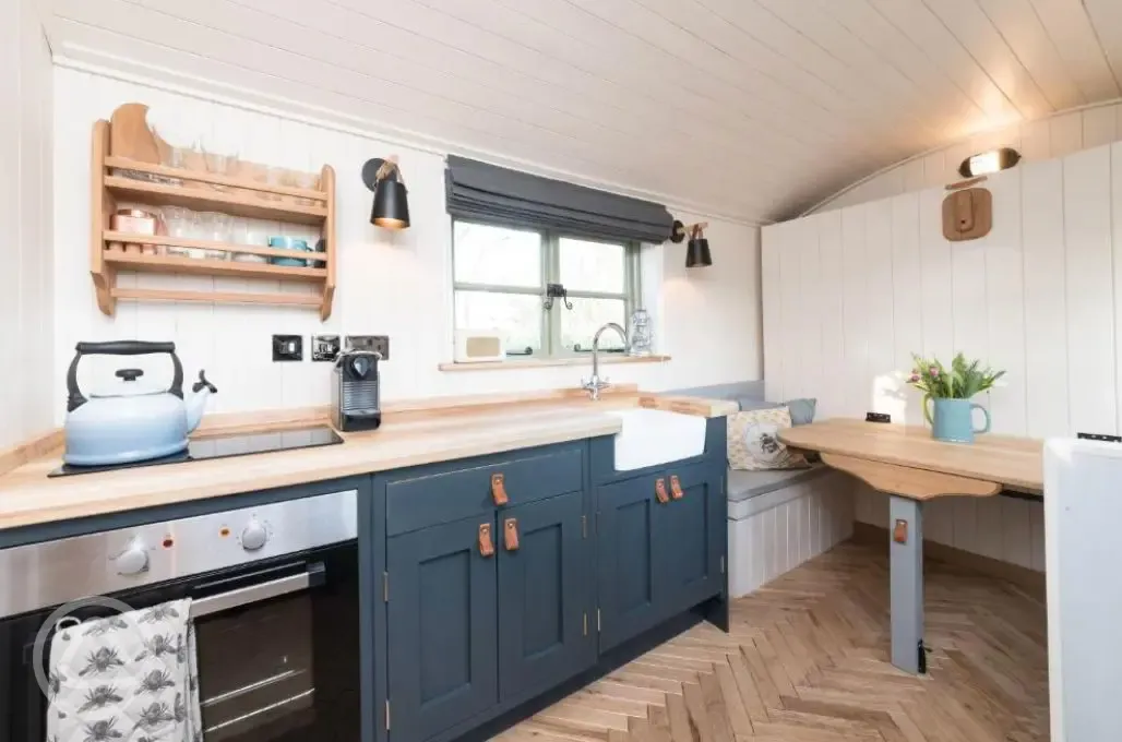 Shepherd's Hut interior with kitchen