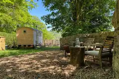Shepherd's hut outdoor seating area Shepherd's hut outdoor seating area