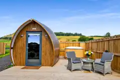 Glamping pod with hot tub