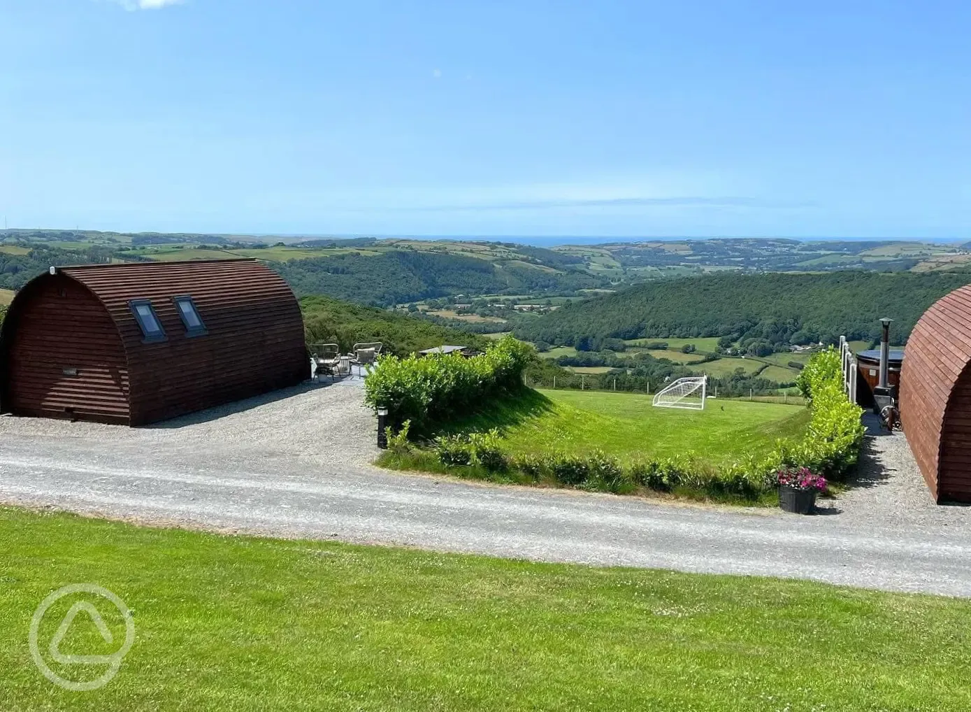 Pods with countryside and coastal views