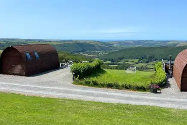 Pods with countryside and coastal views