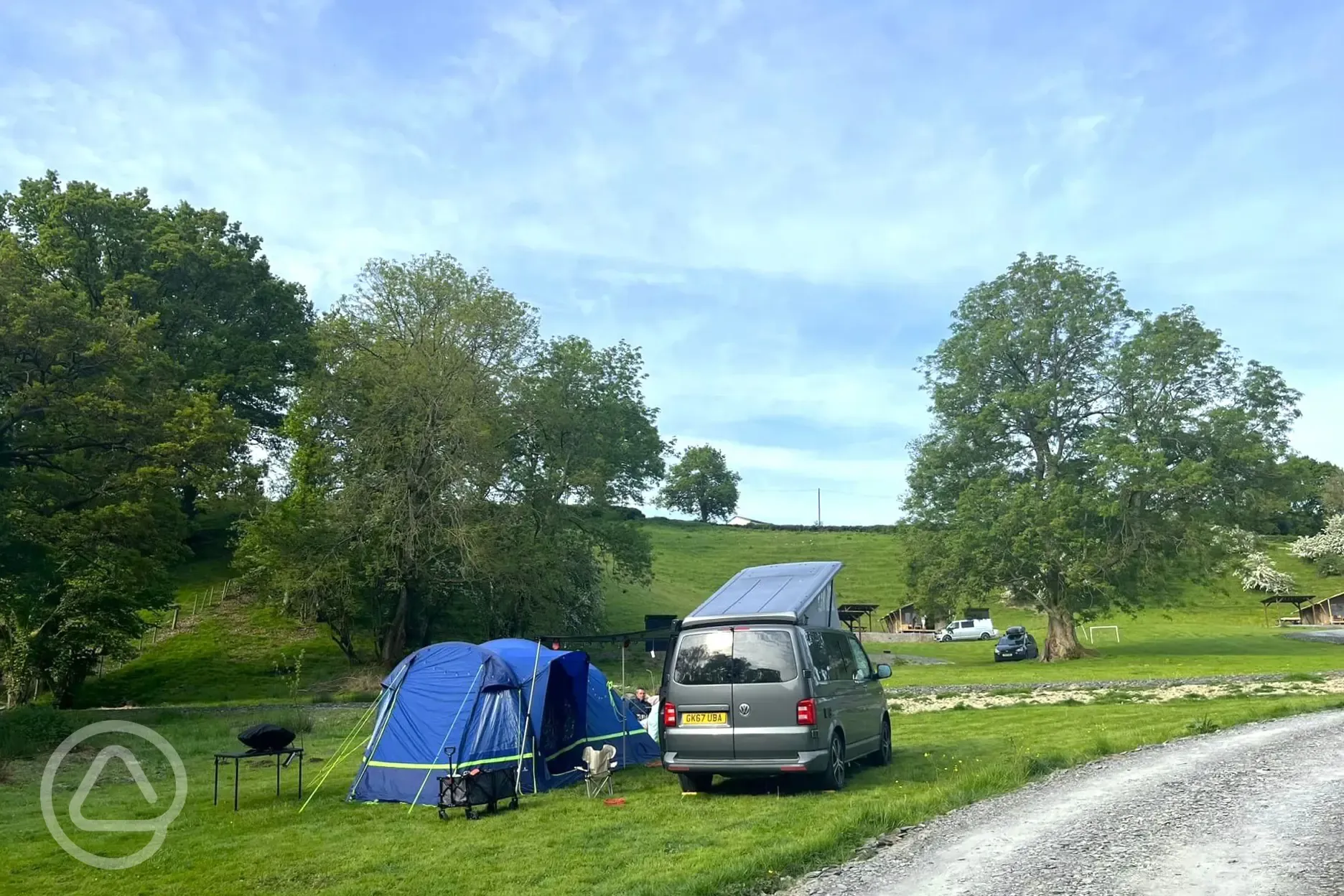 Grass campervan and tent pitch