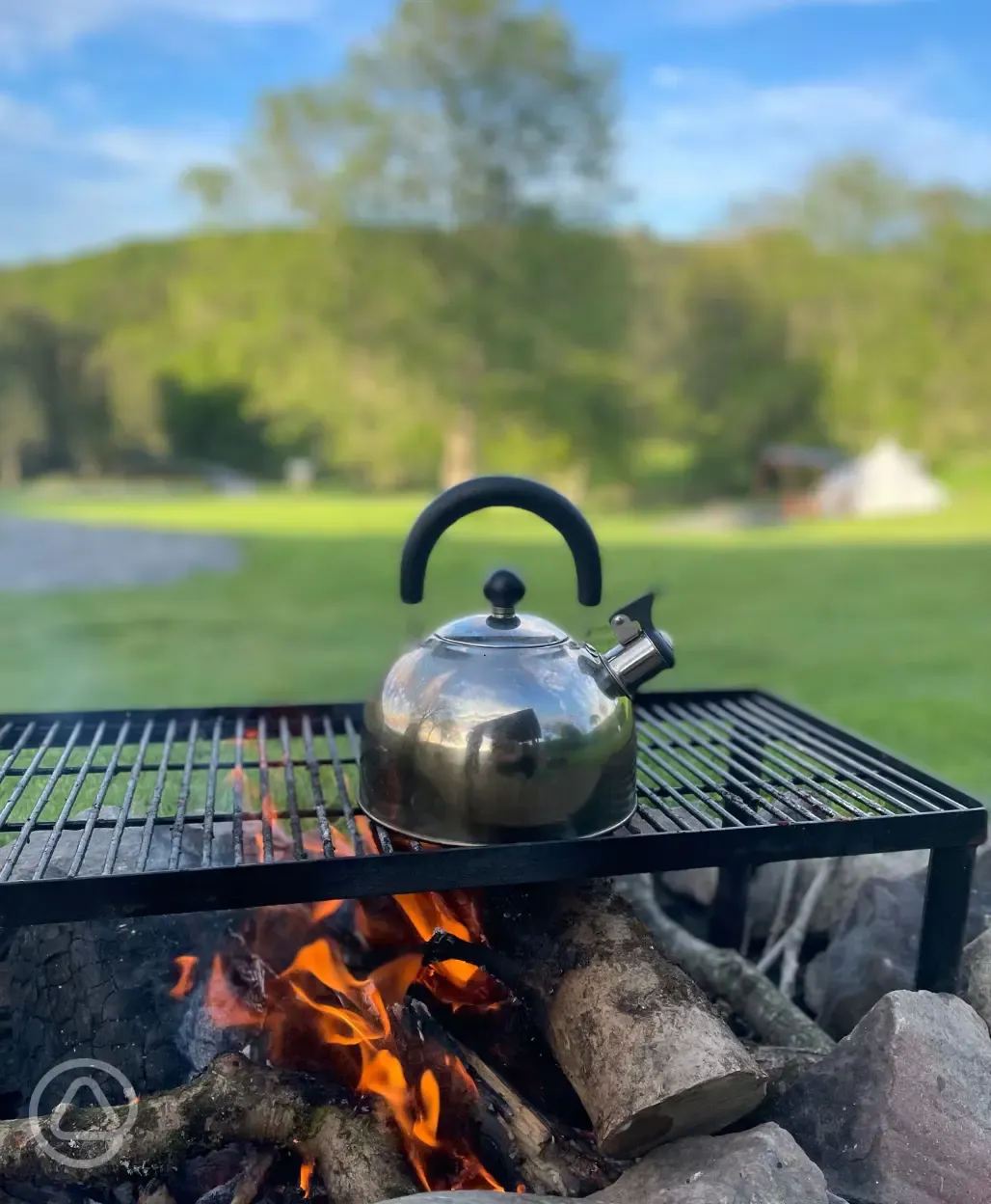 Heating up the kettle on the fire pit