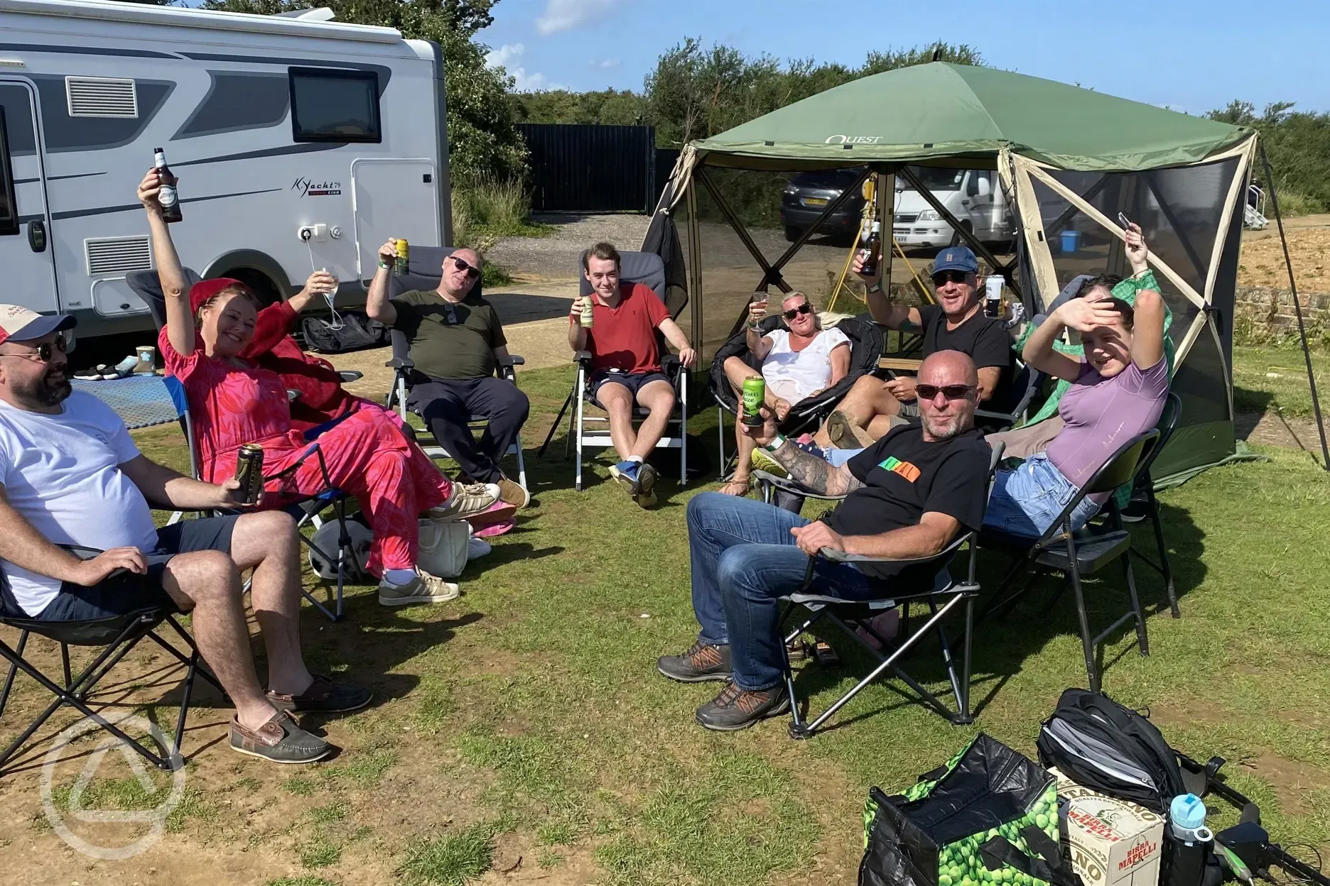 Campers on the grass pitches 