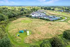 Aerial of the non electric grass tent pitches beside Oakwood Marina Aerial of the non electric grass tent pitches beside Oakwood Marina
