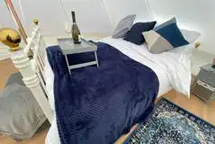 Bell tent double bed (bedding provided) at Oakwood Marina