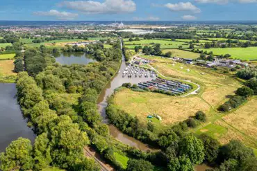 Aerial of Oakwood Marina grass pitches and bell tents