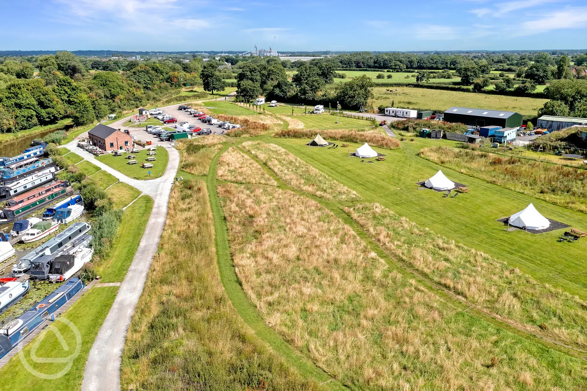 Aerial of the bell tents and marina