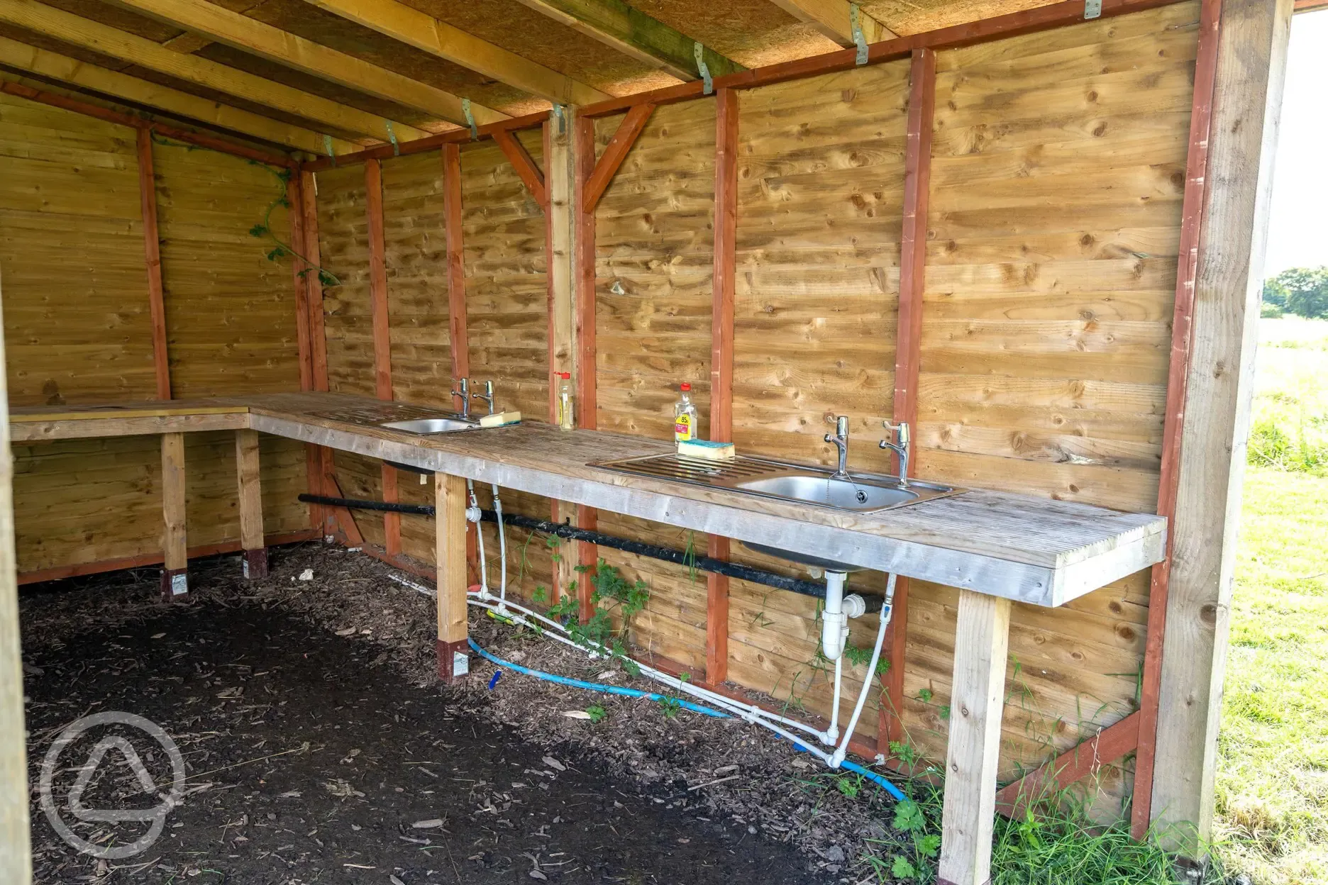 Washing up area by the non electric grass pitches at Oakwood Marina