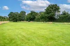 Electric grass touring pitches for roof tents, campervans, and motorhomes Electric grass touring pitches for roof tents, campervans, and motorhomes