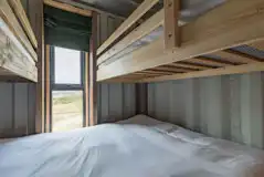 Glamping cabin with a cabin bed and bunks Glamping cabin with a cabin bed and bunks