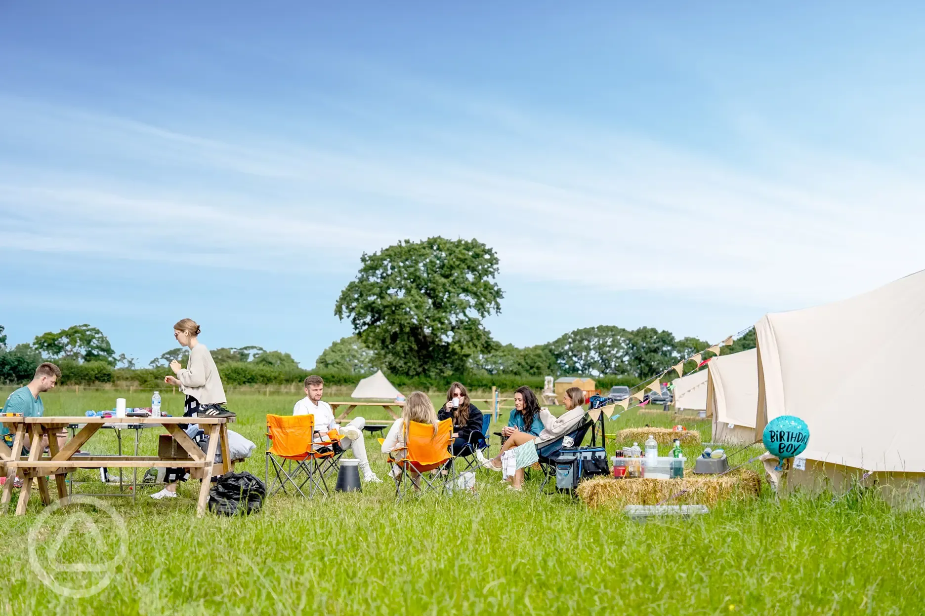 Communal area outside the bell tents