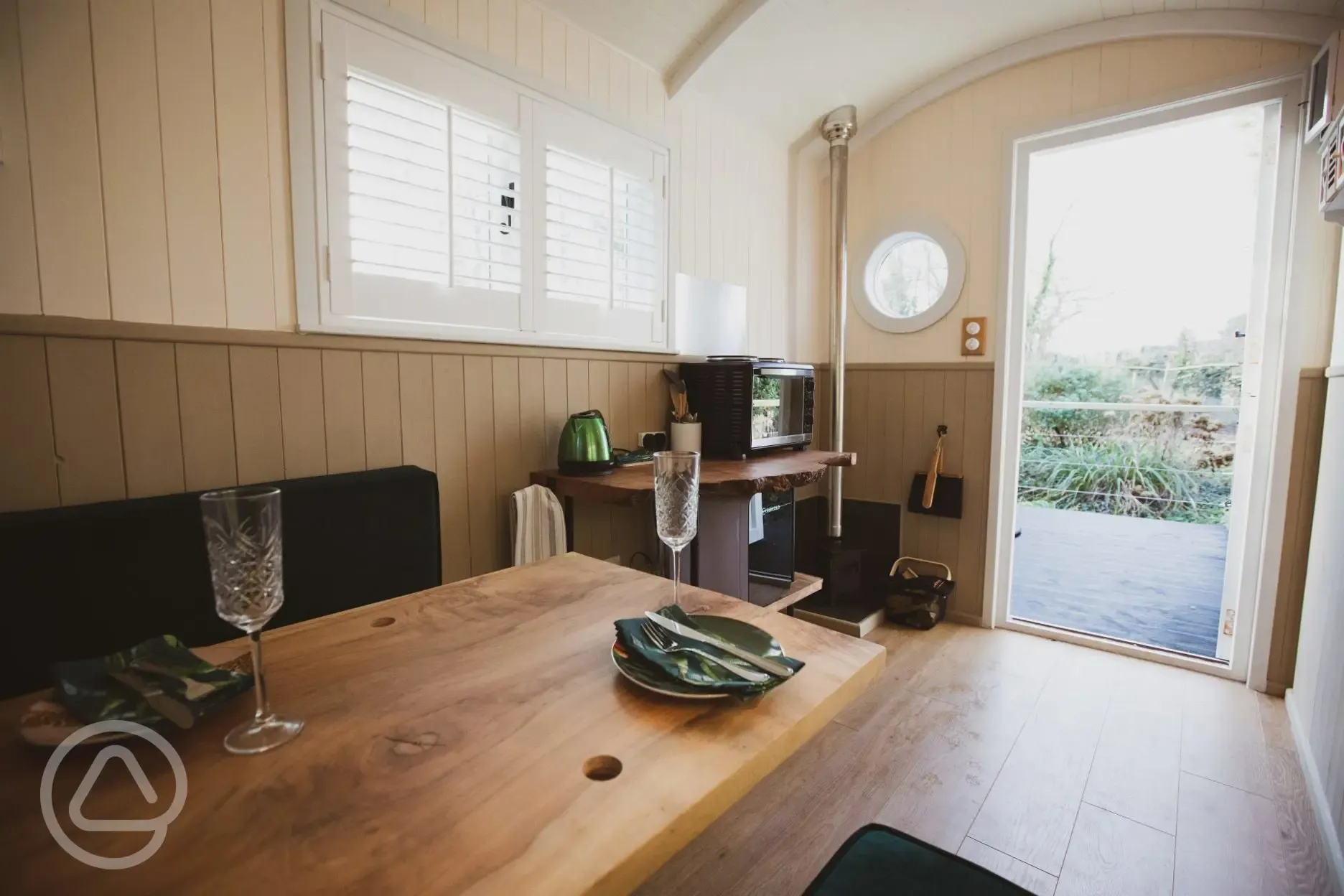 Shepherd's hut interior which converts into a double bed