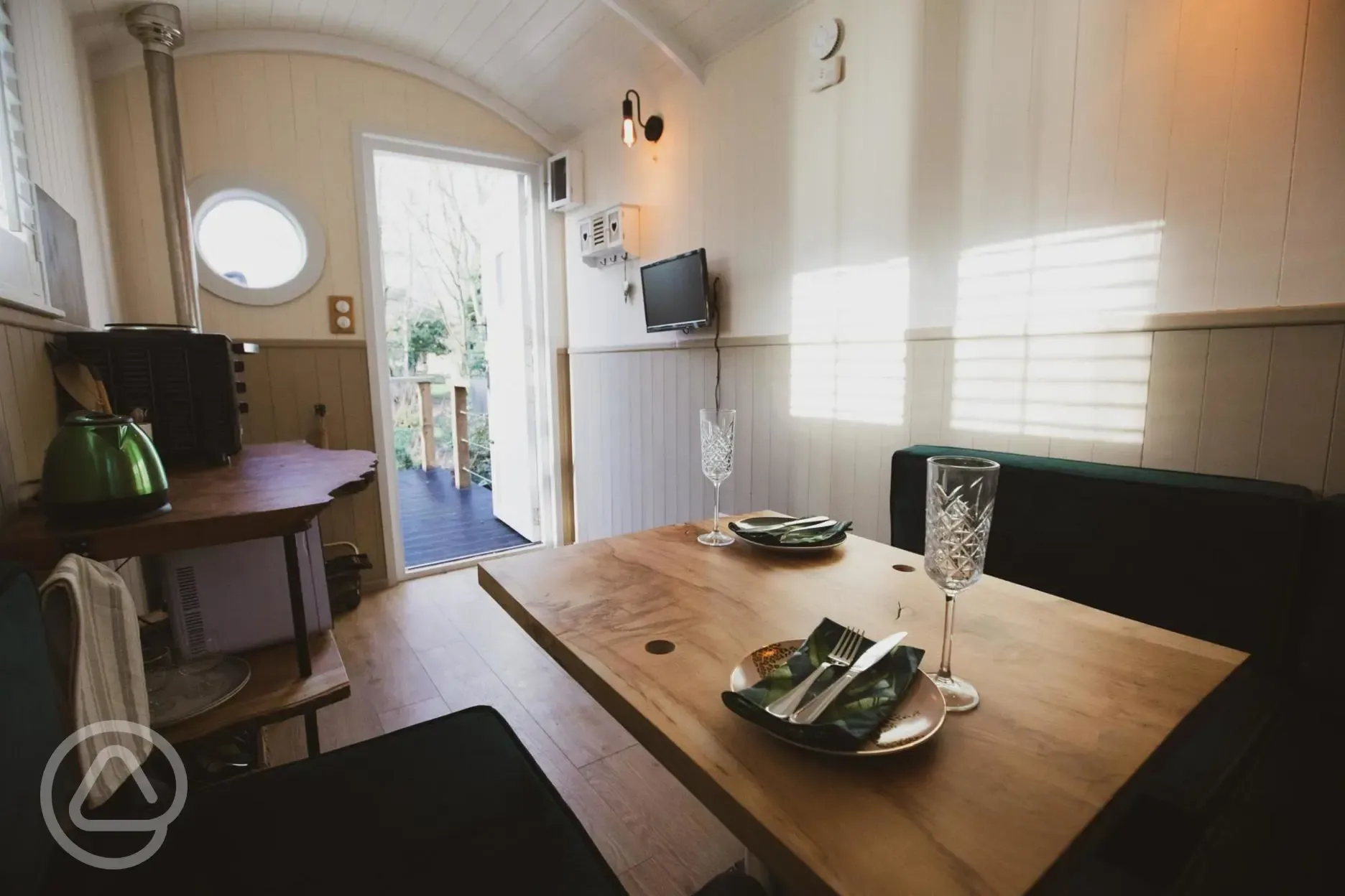 Shepherd's hut interior which converts into a double bed