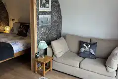 Double bed in The Heron's Nest interior (bedding included)