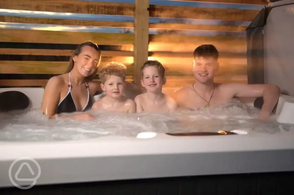 Family in hot tub