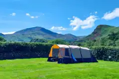Electric grass tent and campervan pitches with 10 amp hook ups