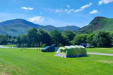 Large tent on the electric grass tent and campervan pitches at Cae Du Campsite