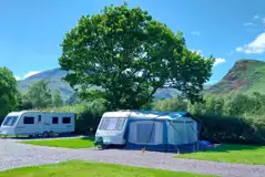 Electric hardstanding and grass pitches (10m x 10m)