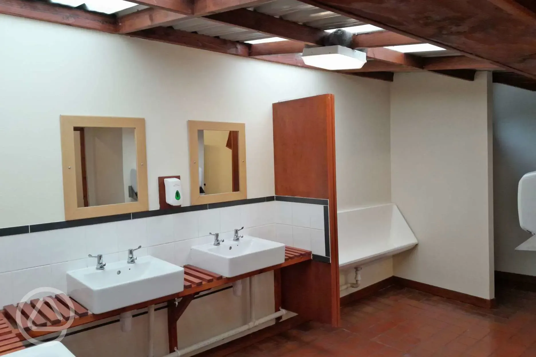 Men's facilities with urinals and sinks