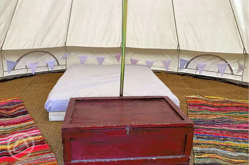 Five person bell tent interior with three extra airbeds available