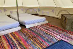 Three person bell tent interior at Giddy Farm Three person bell tent interior at Giddy Farm