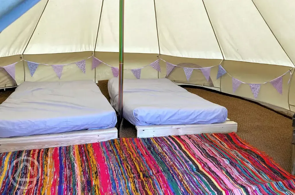 Three person bell tent interior at Giddy Farm