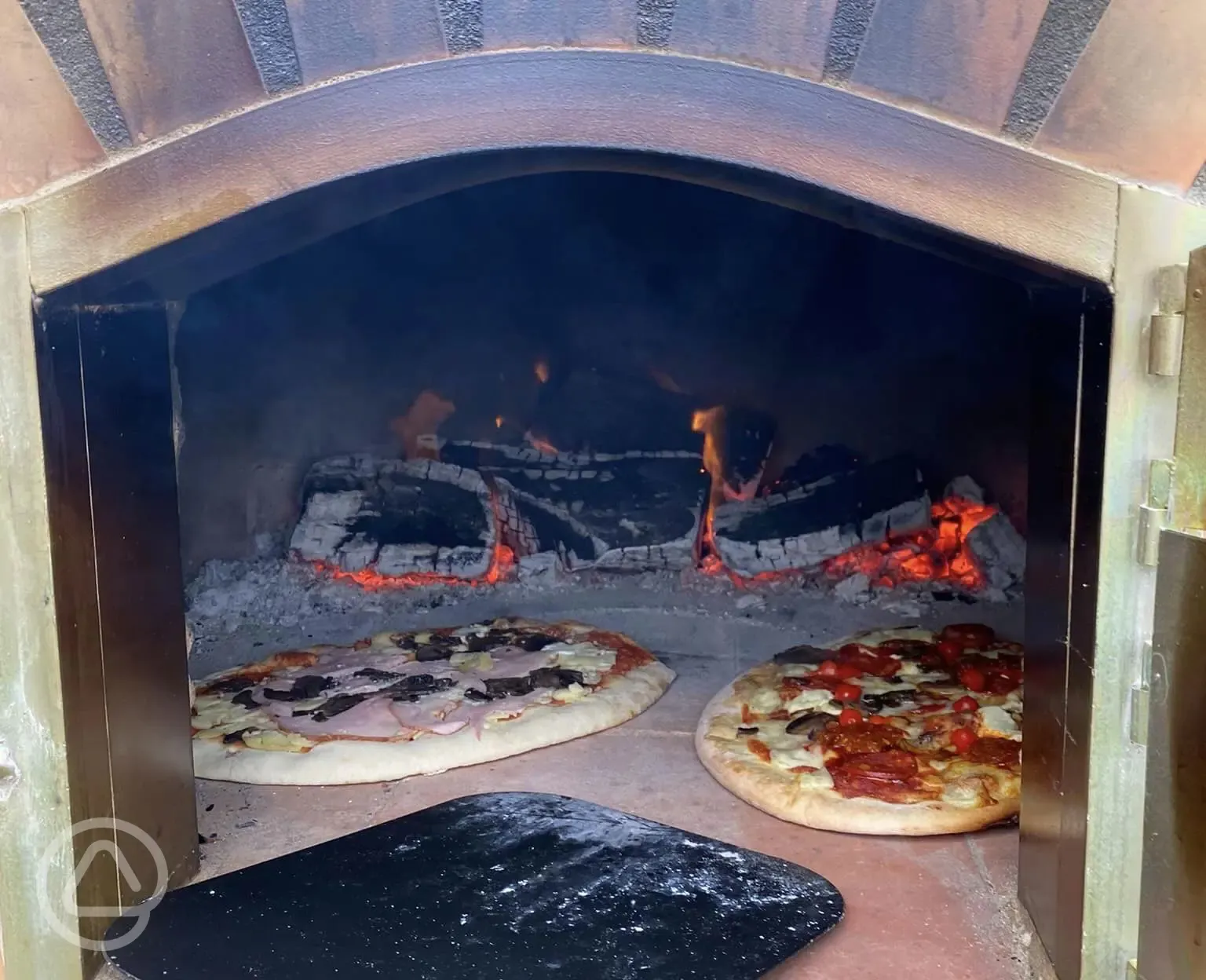 Wood-fired pizza oven at Giddy Farm for guests