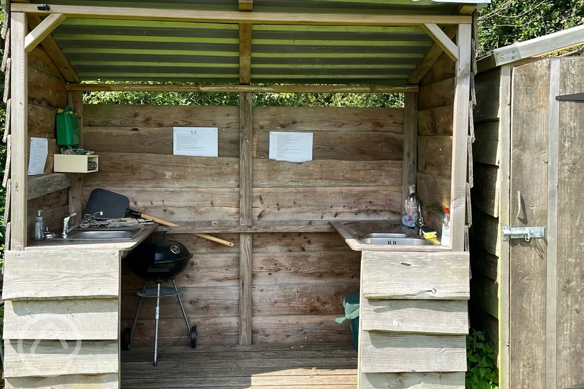 Communal washing up area with hot and cold water