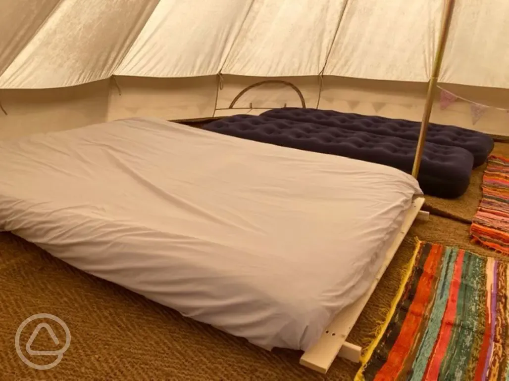 Five person bell tent interior at Giddy Farm