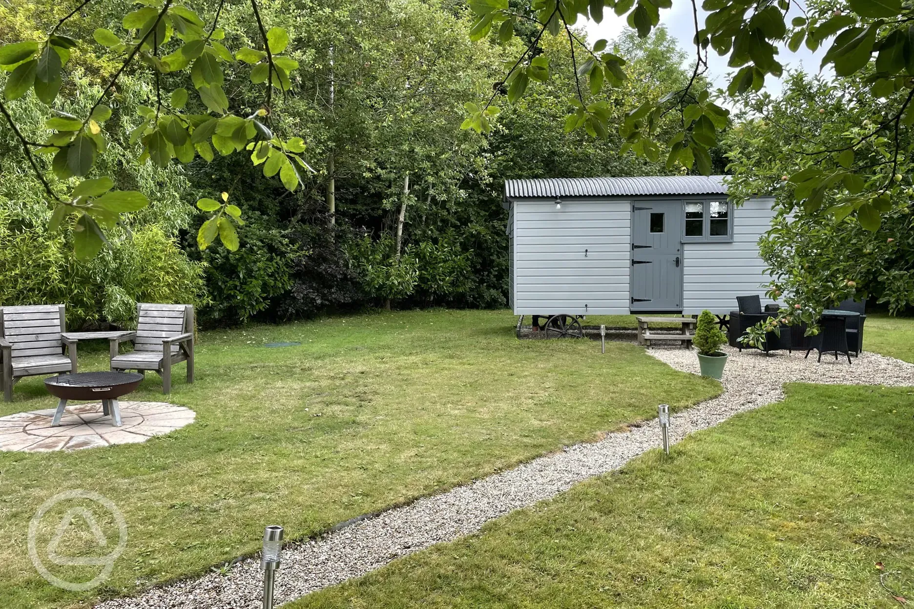 Shepherd's hut and outdoor seating area