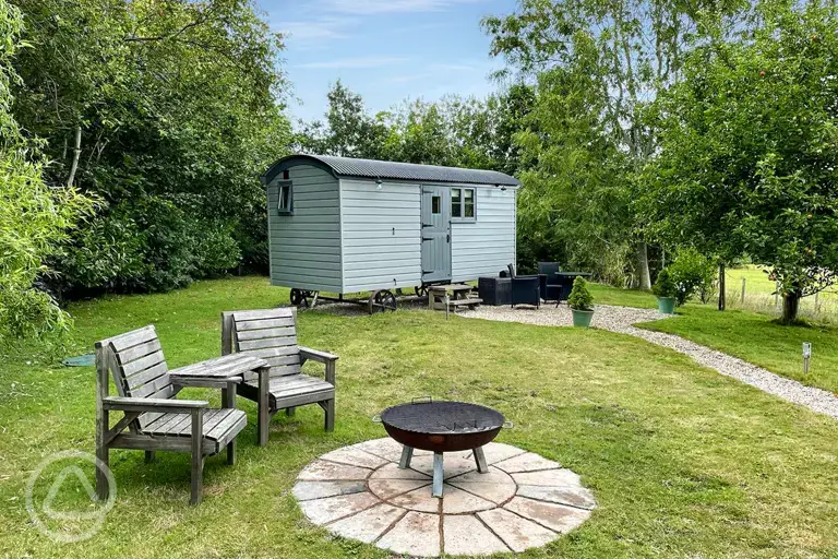 Shepherd's hut and fire pit