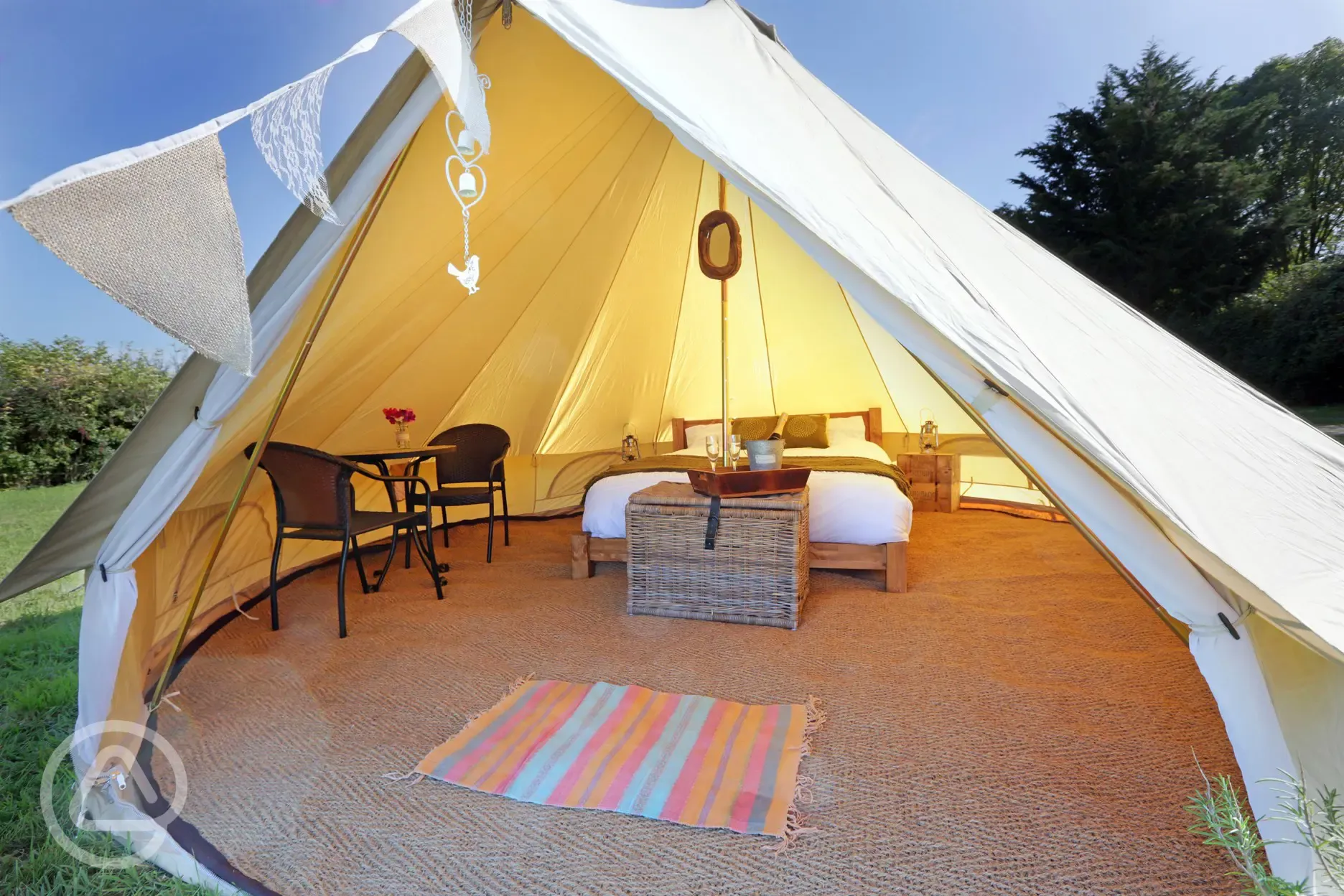 Each of the five 5m bell tents is furnished with a sumptuous king size bed
