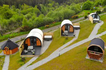 Glamping pods with the sauna and BBQ hut