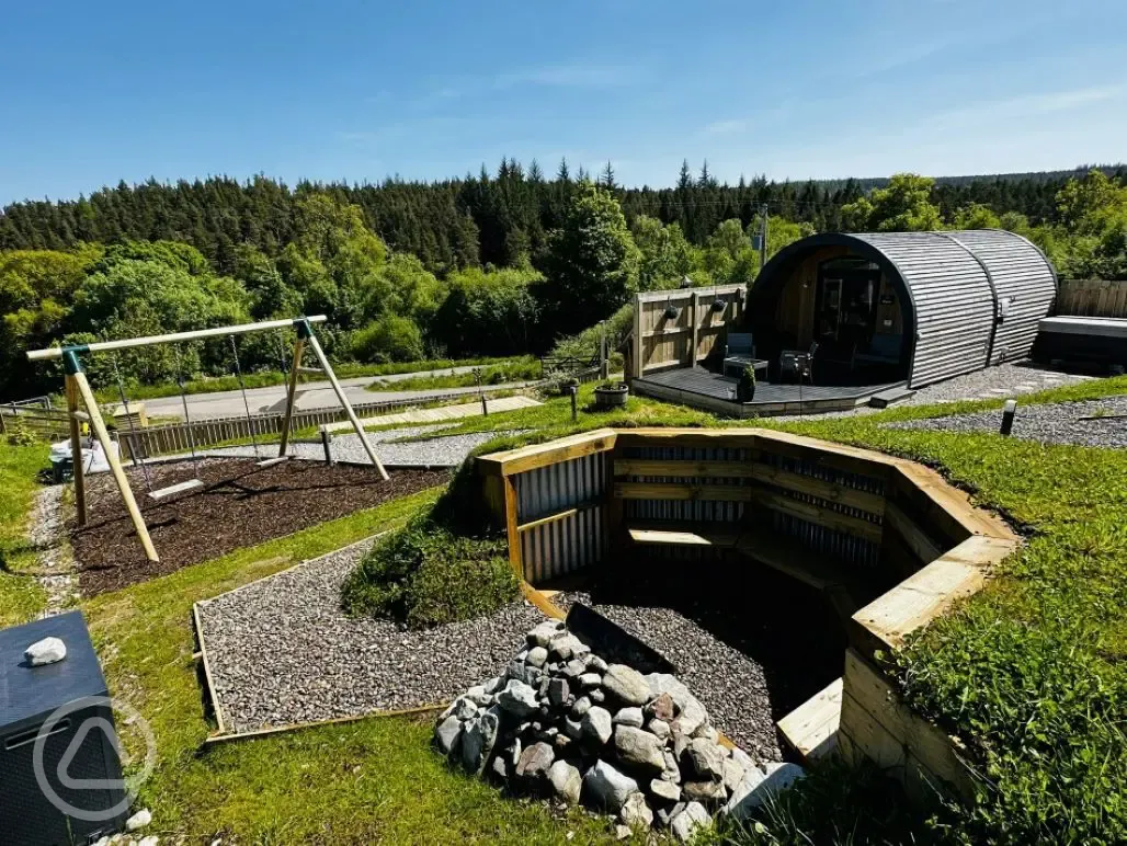 Communal fire pit and swings